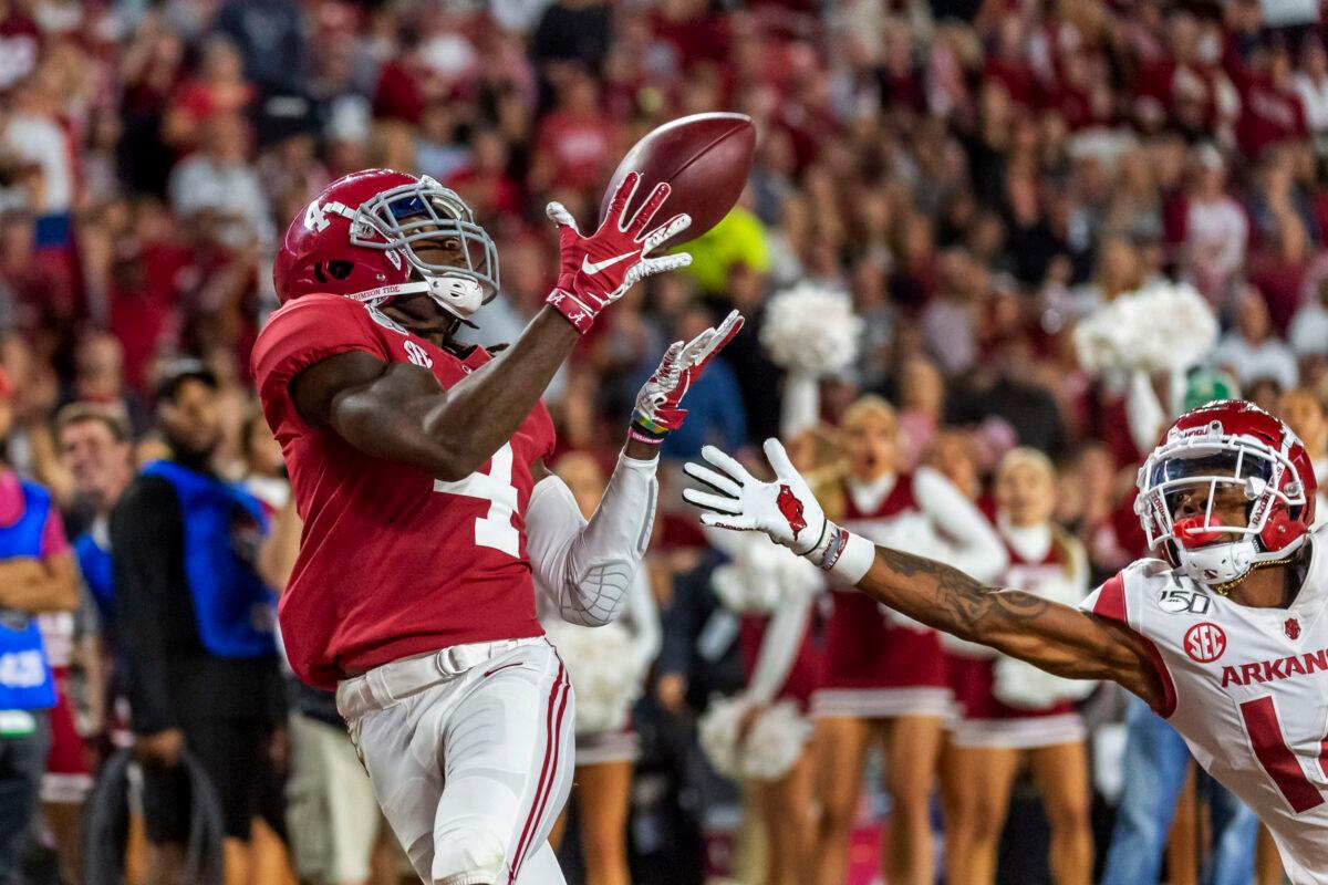 Alabama wide receiver Jerry Jeudy (4) catches a touchdown pass against Arkansas during the second half of an NCAA college football game in Tuscaloosa, Alabama, on Oct. 26, 2019. (Vasha Hunt/AP Photo)
