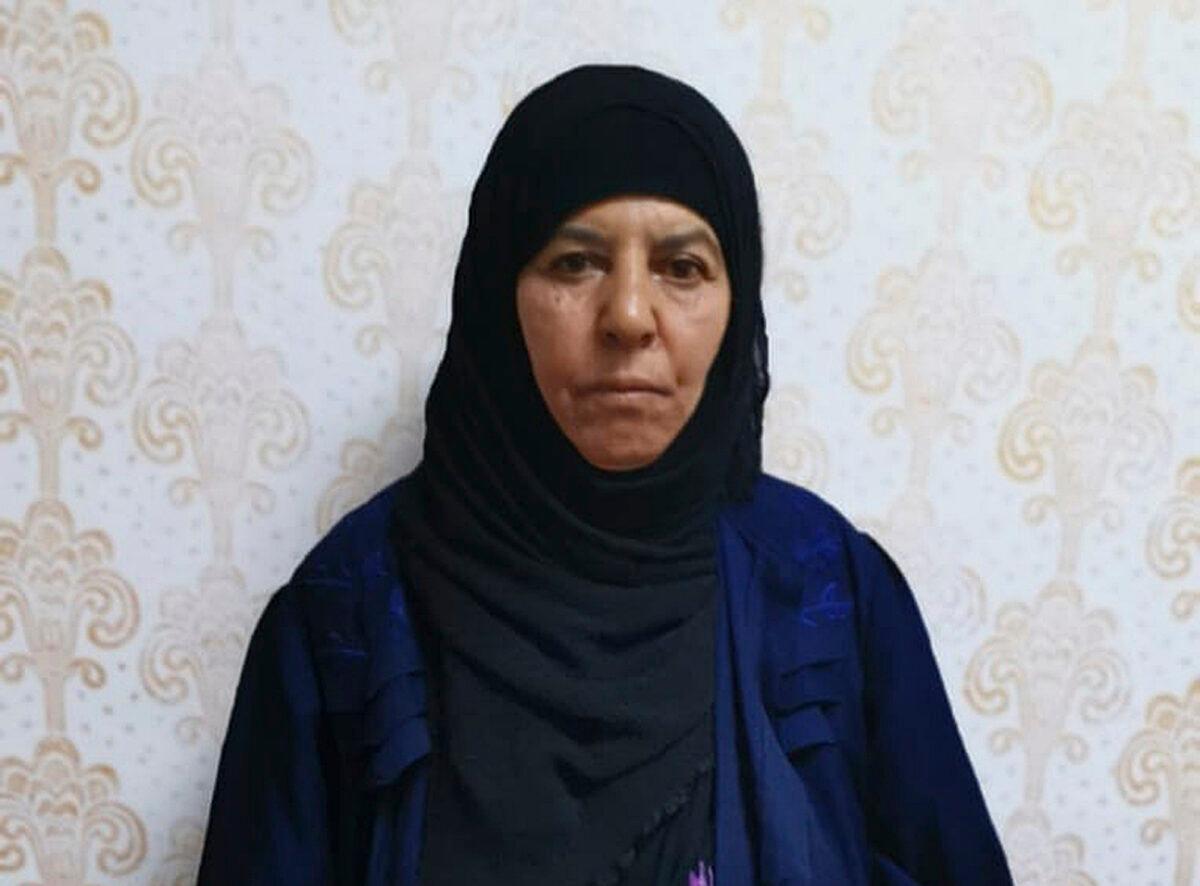 Undated handout photo made available by unnamed government sources showing a 65-year-old woman known as Rasmiya Awad, who is the sister of the slain leader of the Islamic State group Abu Bakr al-Baghdadi. Awad was captured in a raid Monday evening on a trailer container she was living in with her family near the town of Azaz in Aleppo province. (Handout via AP)