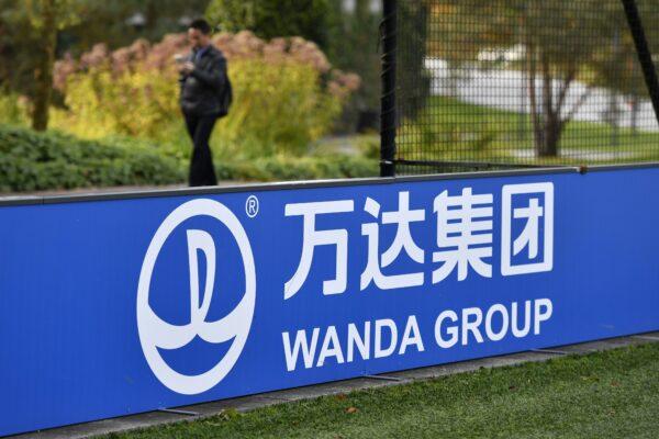 The sign and logo of Wanda Group, a Chinese multinational conglomerate corporation and FIFA partner, is seen at the world football's governing body headquarters in Zurich on Oct. 13, 2016.<br/>(Fabrice Coffrini/AFP via Getty Images)