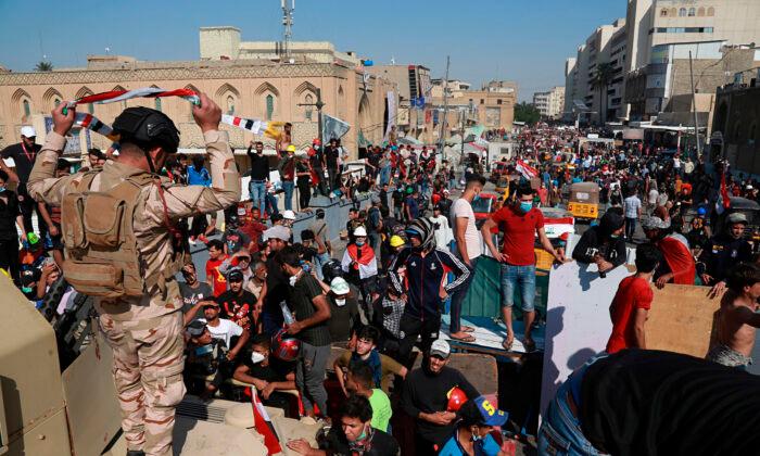 Iraq Protesters Storm Baghdad Bridge, Medic Killed