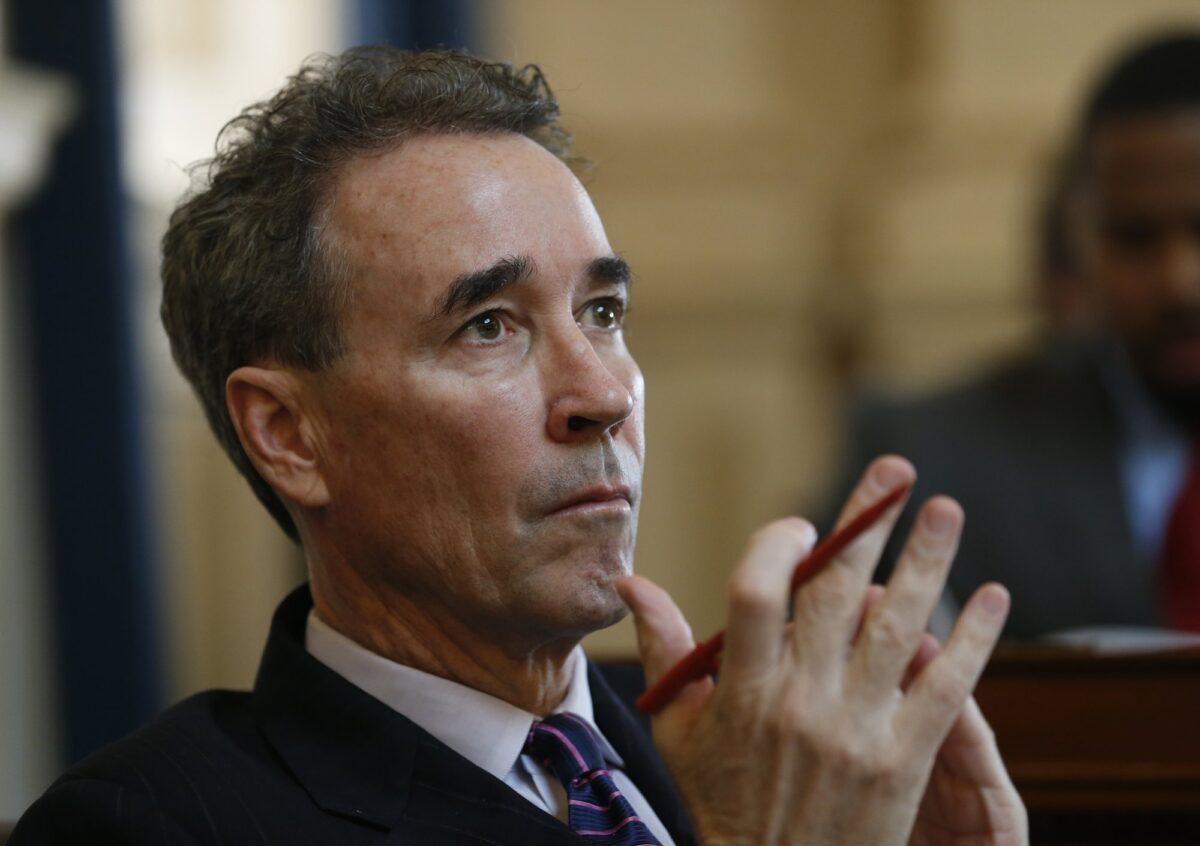 In this Jan. 20, 2015, file photograph, Joe Morrissey watches the proceedings during the House of Delegates session at the Capitol in Richmond, Va. (Steve Helber/AP Photo)