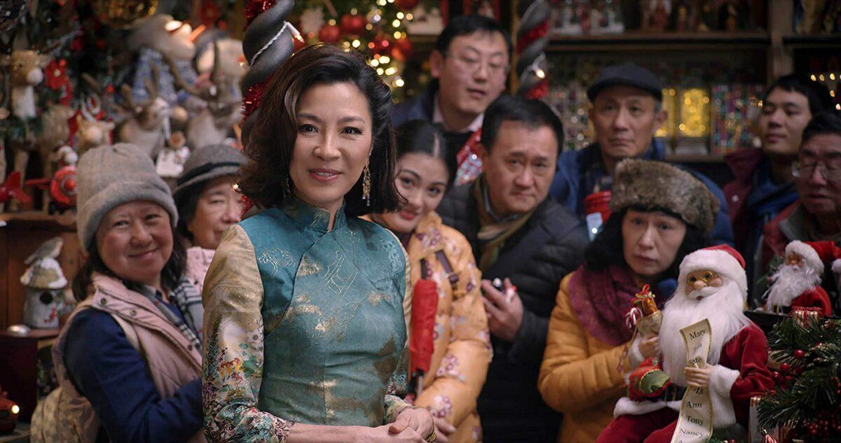 <span style="color: #000000;">Michelle Yeoh amid a sea of Asian faces, in a British Christmas decorations store, in “Last Christmas." Is that not perhaps a bit odd? (Universal Pictures)</span>