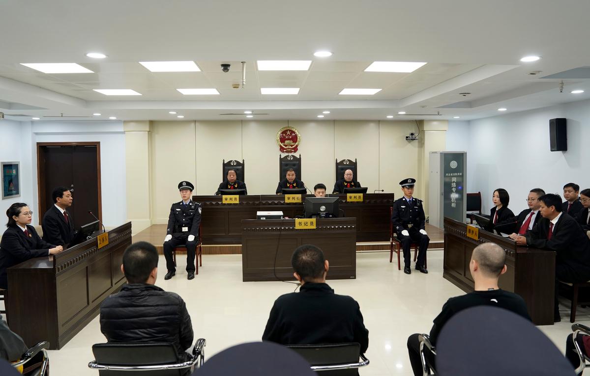 A trial continues as fentanyl drug traffickers are sentenced in court in Xingtai, north China's Hebei Province on Nov. 7, 2019. (Jin Liangkuai/Xinhua via AP)