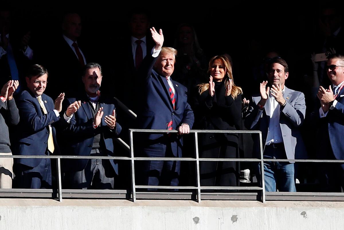 President Donald Trump and first lady Melania Trump attend the game between the LSU Tigers and the Alabama Crimson Tide at Bryant-Denny Stadium on November 09, 2019 in Tuscaloosa, Alabama. (Photo by Todd Kirkland/Getty Images)