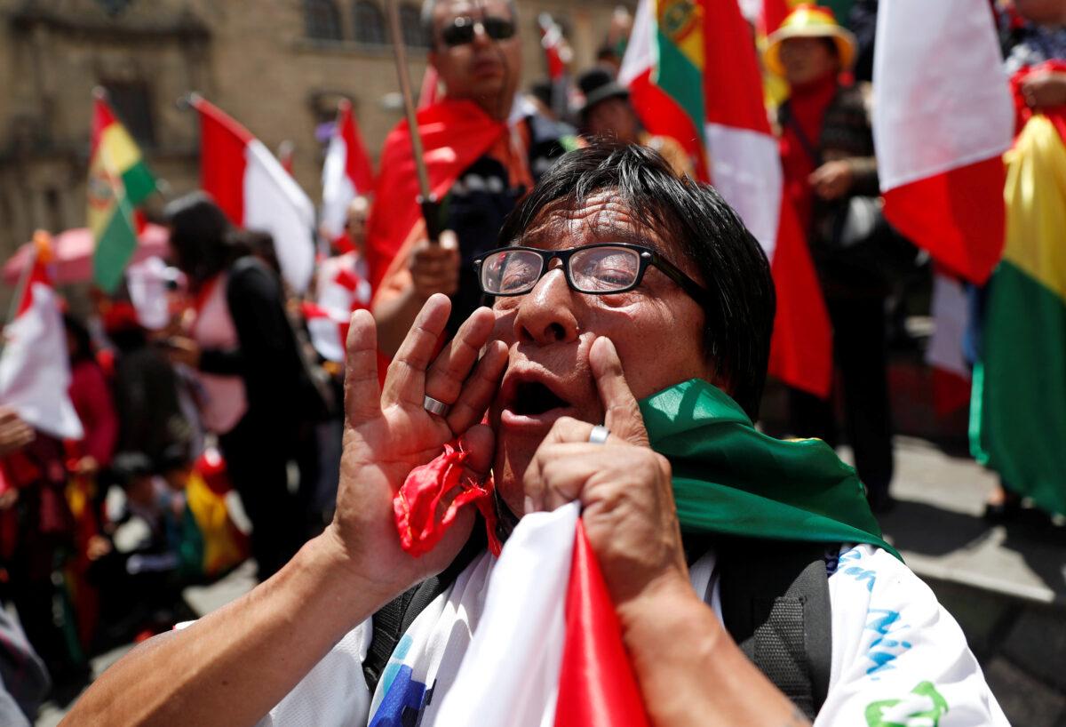 A demonstrator shouts during a protest against Bolivia's President Evo Morales in La Paz, Bolivia, on Nov. 10, 2019. (Reuters/Carlos Garcia Rawlins)