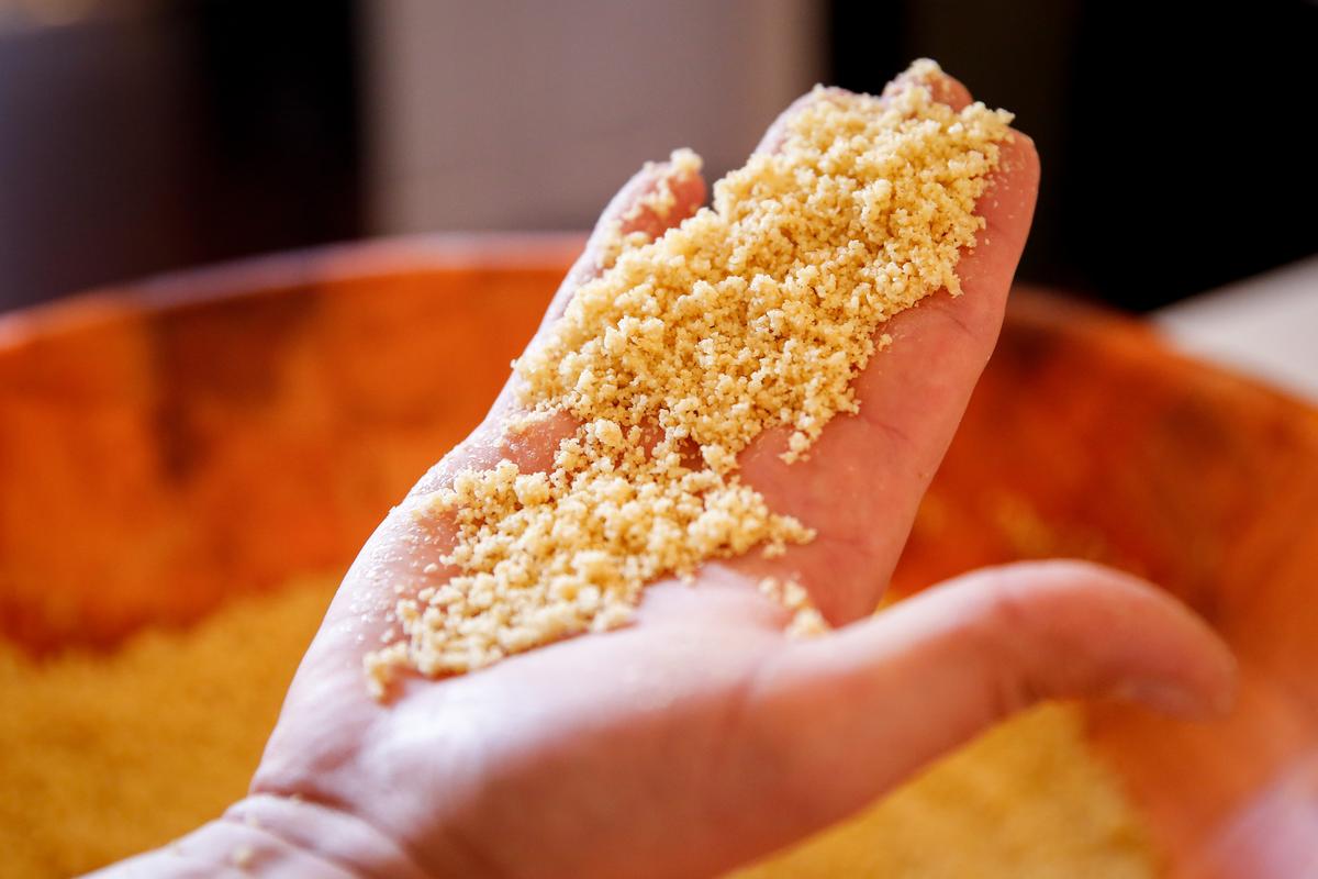 Hand-rolled couscous in the making. (Samira Bouaou/The Epoch Times)