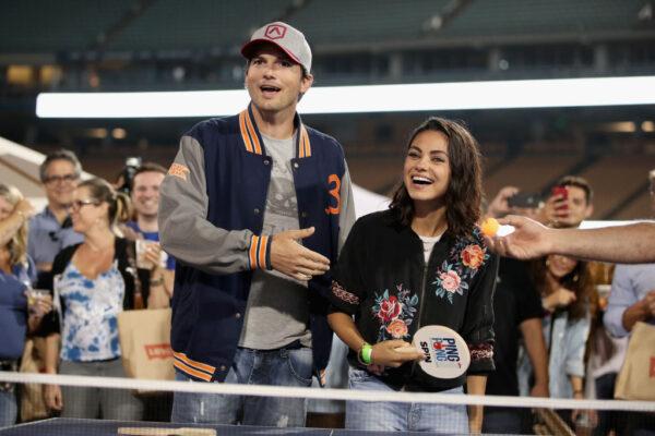 Ashton Kutcher (L) and Mila Kunis play ping pong at Clayton Kershaw's 6th Annual Ping Pong 4 Purpose in Los Angeles, Calif., on Aug. 23, 2018. (Christopher Polk/Getty Images for Kershaw's Challenge)