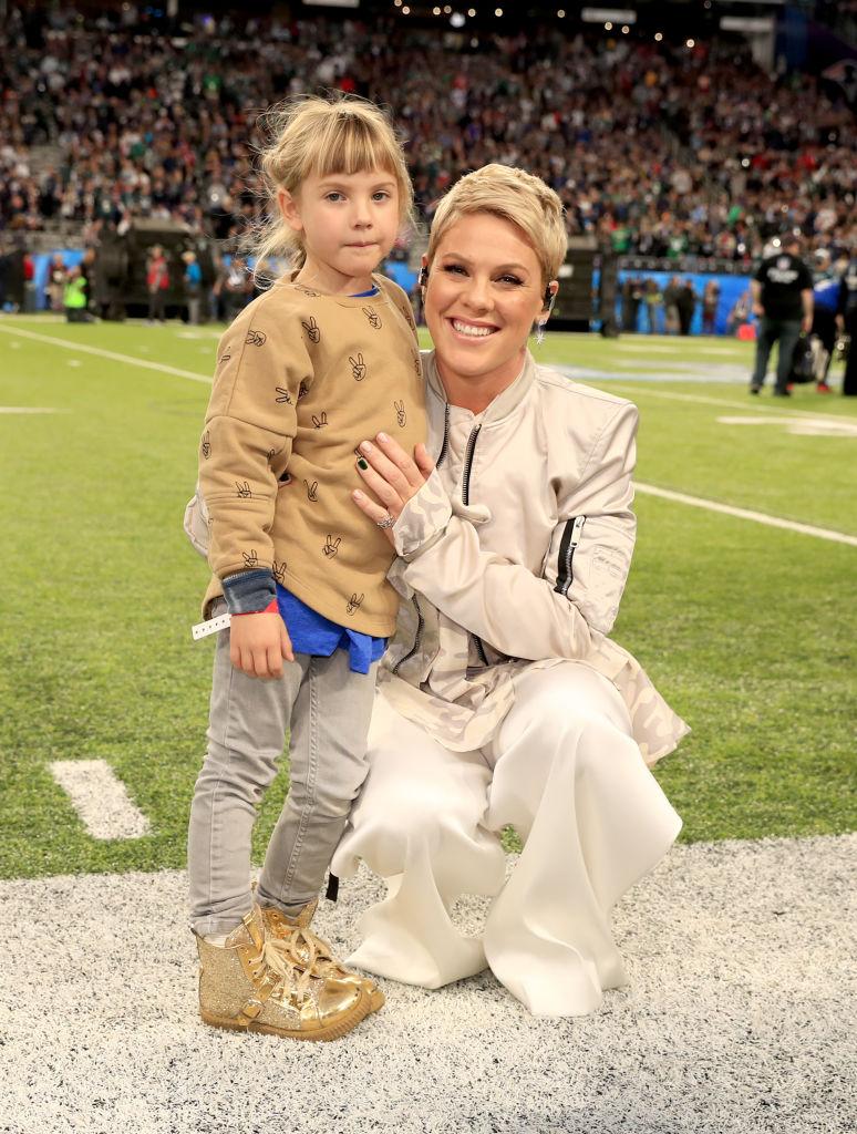 Pink with her daughter, Willow, before the 2018 Super Bowl (©Getty Images | <a href="https://www.gettyimages.com/detail/news-photo/recording-artist-pink-poses-with-daughter-willow-sage-hart-news-photo/914303898?adppopup=true">Christopher Polk</a>)