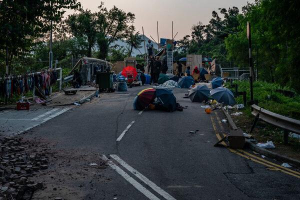 Protesters camp in front of a barricade at the Chinese University of Hong Kong on Nov. 14, 2019. (Anthony Kwan/Getty Images)