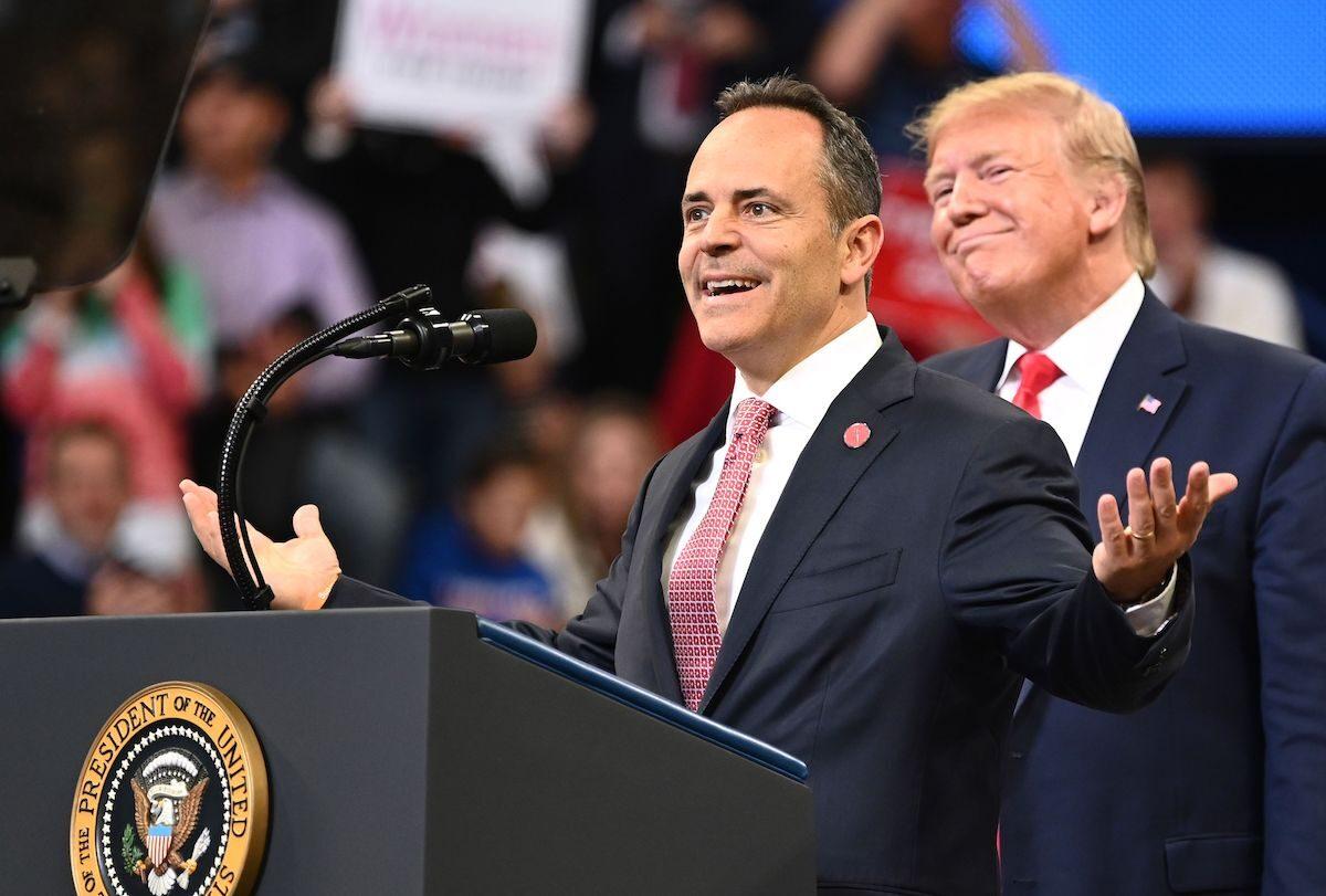 President Donald Trump (R) smiles behind Kentucky Governor Matt Bevin during a rally at Rupp Arena in Lexington, Ky., on Nov. 4, 2019. (Mandel Ngan/AFP via Getty Images)