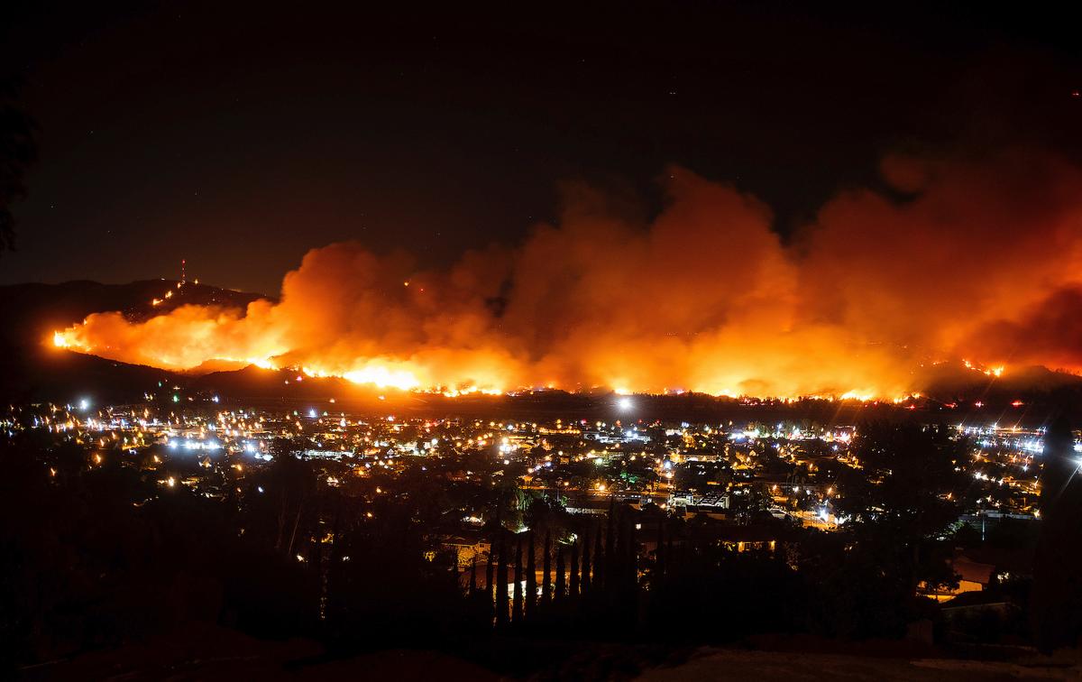 Smoke from the Maria Fire billows above Santa Paula, Calif. on Oct. 31, 2019. (AP Photo/Noah Berger, File)