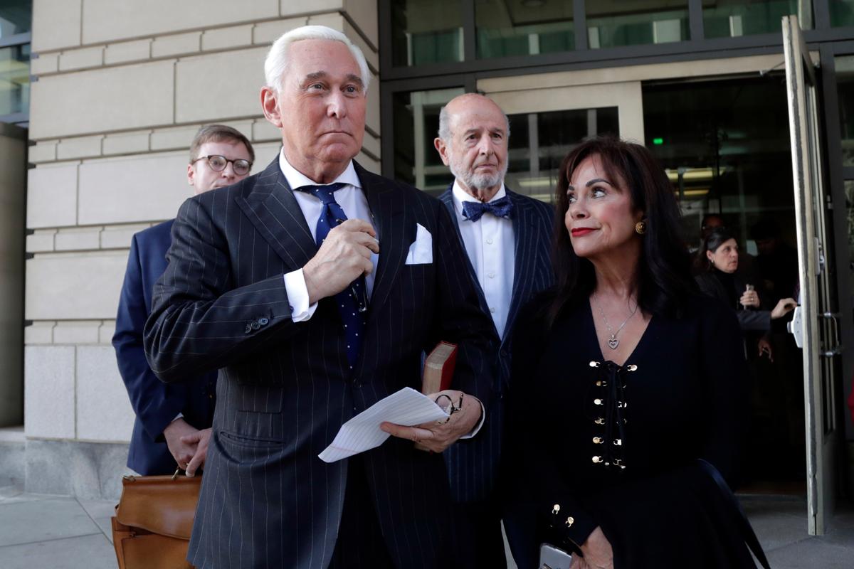 Roger Stone (L) with his wife Nydia Stone leaves federal court in Washington on Nov. 15, 2019. (Julio Cortez/AP Photo)