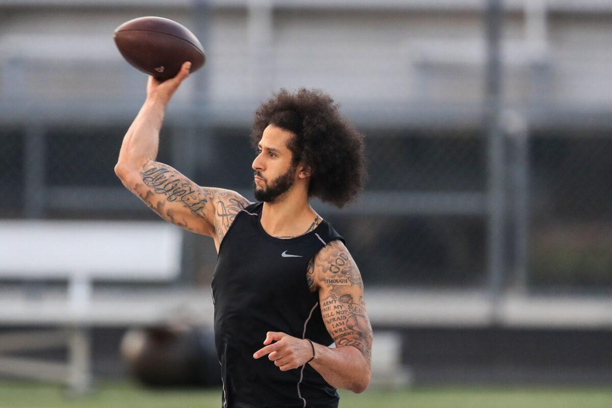 Colin Kaepernick makes a pass during a private NFL workout held at Charles R Drew high school on November 16, 2019 in Riverdale, Georgia. Due to disagreements between Kaepernick and the NFL the location of the workout was abruptly changed. (Carmen Mandato/Getty Images)