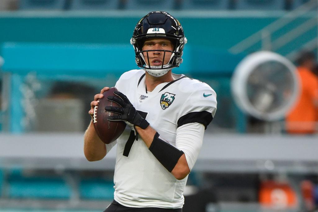 Nick Foles preparing for a preseason game against the Miami Dolphins in 2019 (©Getty Images | <a href="https://www.gettyimages.com/detail/news-photo/nick-foles-of-the-jacksonville-jaguars-warms-up-before-the-news-photo/1163246116?adppopup=true">Eric Espada</a>)
