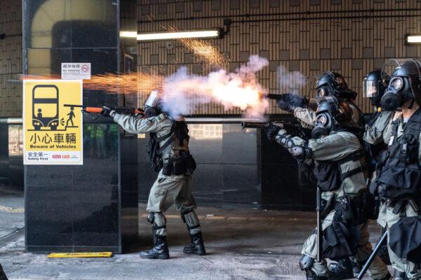 Riot police fire teargas and rubber bullets as protesters attempt to leave the Hong Kong Polytechnic University on Nov. 18, 2019. (Anthony Kwan/Getty Images)