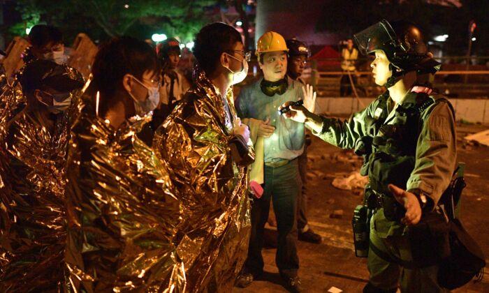 Dozens Remain Trapped on Hong Kong School Campus