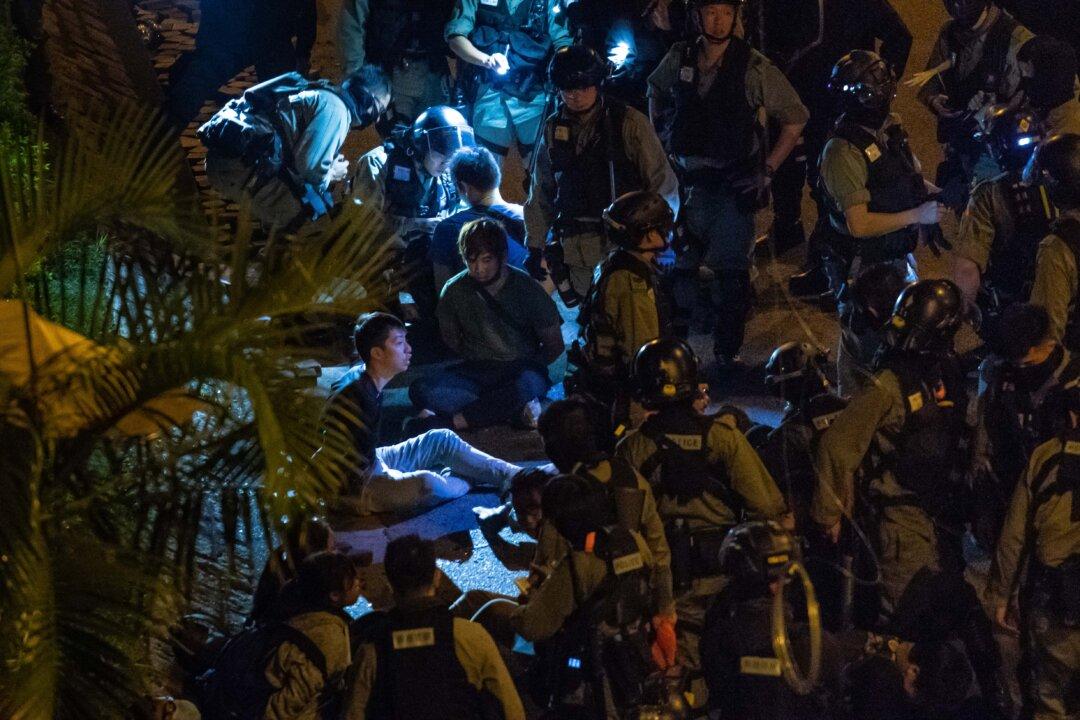 Hong Kong Police Caught on Video Torturing and Humiliating Detained Protesters