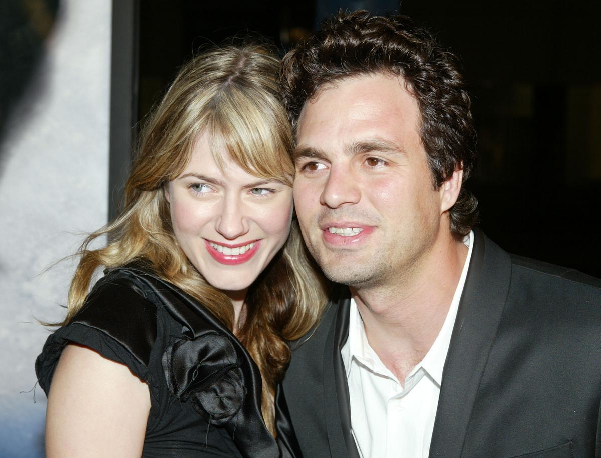 Ruffalo and Coigney at the movie premiere of "Eternal Sunshine of the Spotless Mind" at the Samuel Goldwyn Theater in Los Angeles on March 9, 2004 (©Getty Images | <a href="https://www.gettyimages.com/detail/news-photo/actor-mark-ruffalo-and-wife-sunrise-attend-the-movie-news-photo/3059572">Kevin Winter</a>)