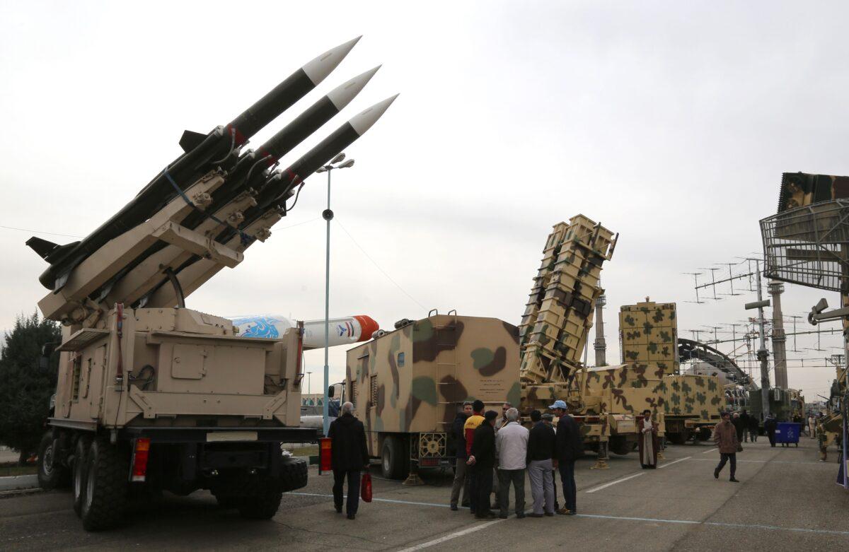 Iranians visit a weaponry and military equipment exhibition in the capital Tehran on Feb. 2, 2019. (Atta Kenare/AFP via Getty Images)