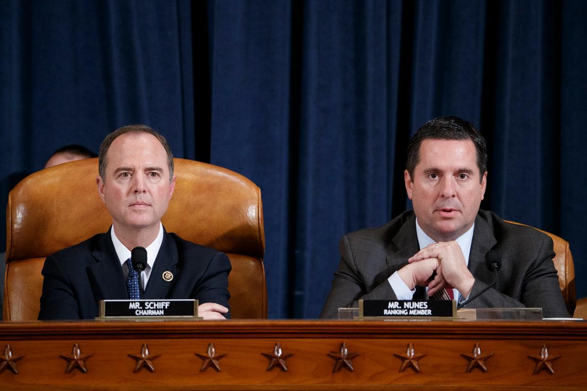 House Intelligence Chairman Adam Schiff (D-Calif.) listens as Ranking Member Rep. Devin Nunes (R-Calif.) speaks at the open impeachment hearing in Washington on Nov. 19, 2019. (Shawn Thew - Pool/Getty Images)