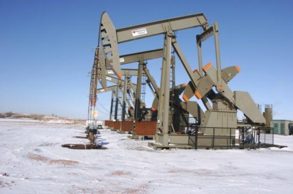 An oil well on the Fort Berthold Indian Reservation near Mandaree, N.D., on Feb. 26, 2015. (AP Photo/Matthew Brown, File)