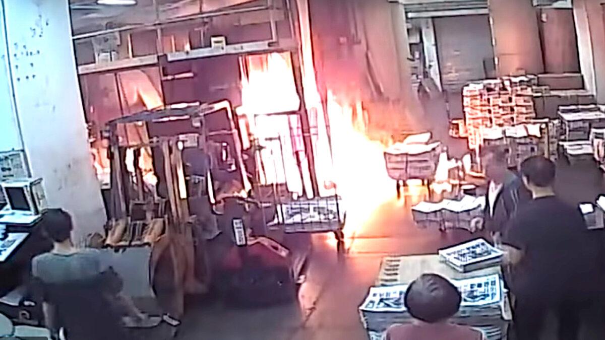 Surveillance footage of the arson attack at the printing press for the Hong Kong edition of the Epoch Times on Nov. 19.