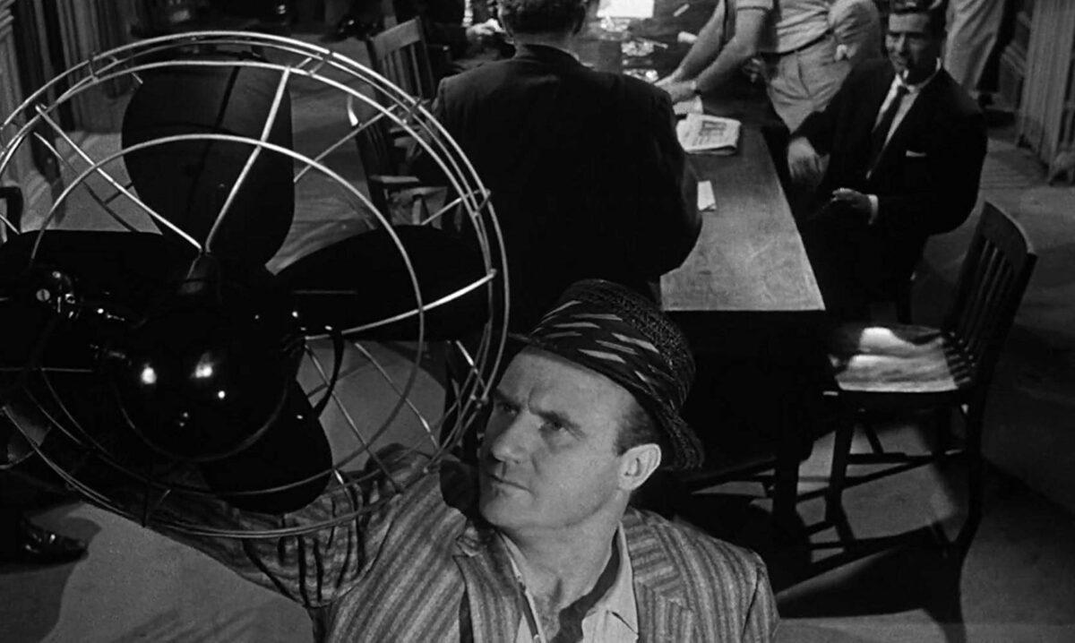 Juror 7 (Jack Warden) realizing the fan doesn't work on the hottest day of the year, in "12 Angry Men." (United Artists)