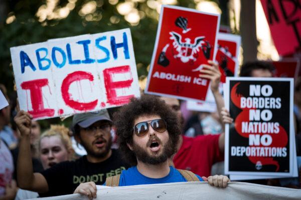 Activists march against Immigration and Customs Enforcement (ICE) and the Trump administration's immigration policies, outside the ICE offices in Federal Plaza in New York City on June 29, 2018. (Photo by Drew Angerer/Getty Images)