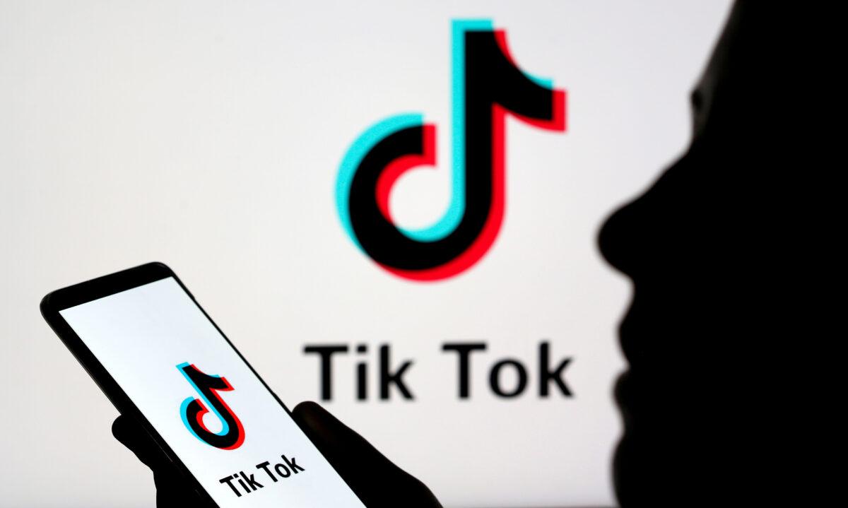 A person holds a smartphone with Tik Tok logo displayed in this picture illustration taken on Nov. 7, 2019. (Dado Ruvic/Illustration/Reuters)
