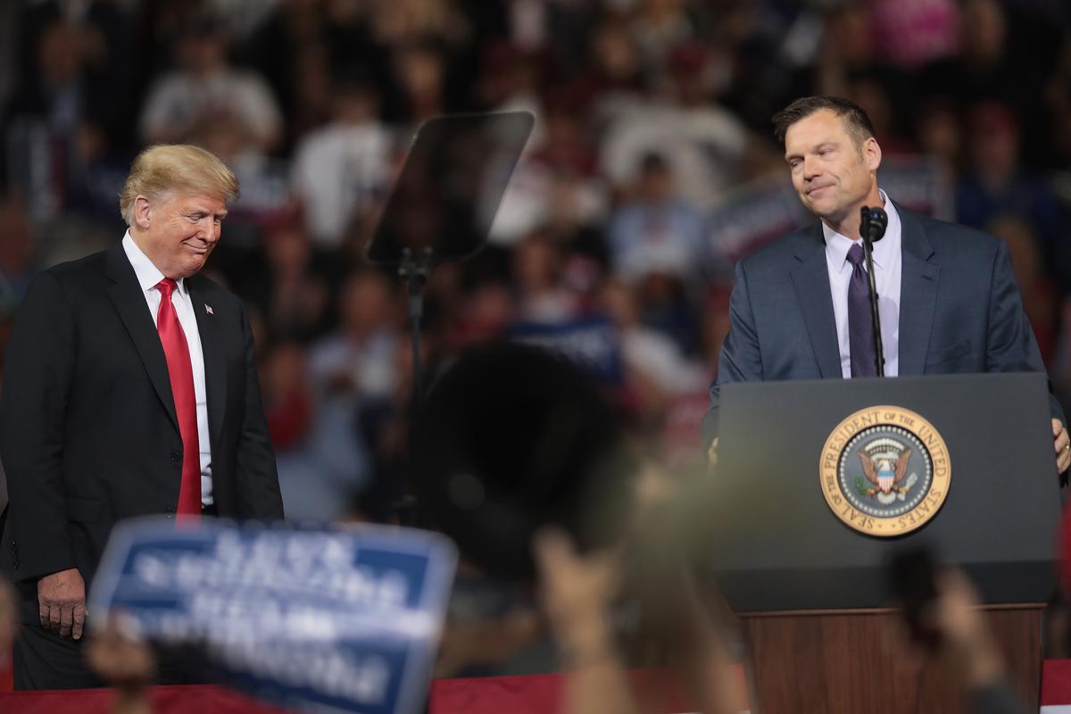 Republican candidate for governor of Kansas Kris Kobach speaks at a rally with President Donald Trump at the Kansas Expocenter in Topeka, Kansas on Oct. 6, 2018. (Photo by Scott Olson/Getty Images)