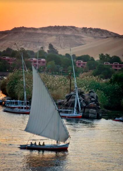 A felucca sailing on the Nile Rile; these distinctively Egyptian small sail boats are a common sight and are evocative of the Nile and Egypt. (Fred J. Eckert)