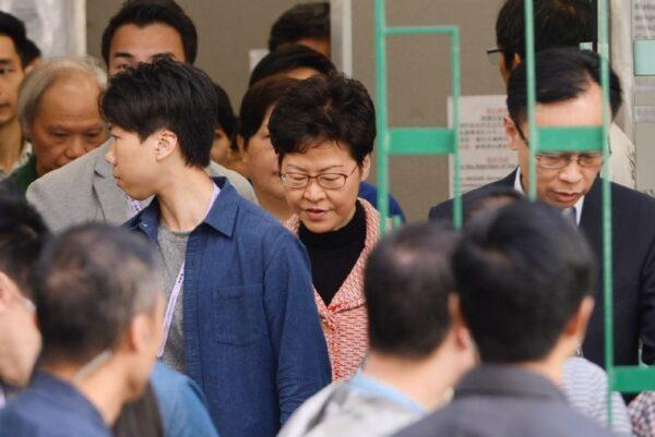Carrie Lam shows up to vote for local district councilors in Hong Kong on Nov. 24, 2019. (Sung Pi Lung/The Epoch Times)