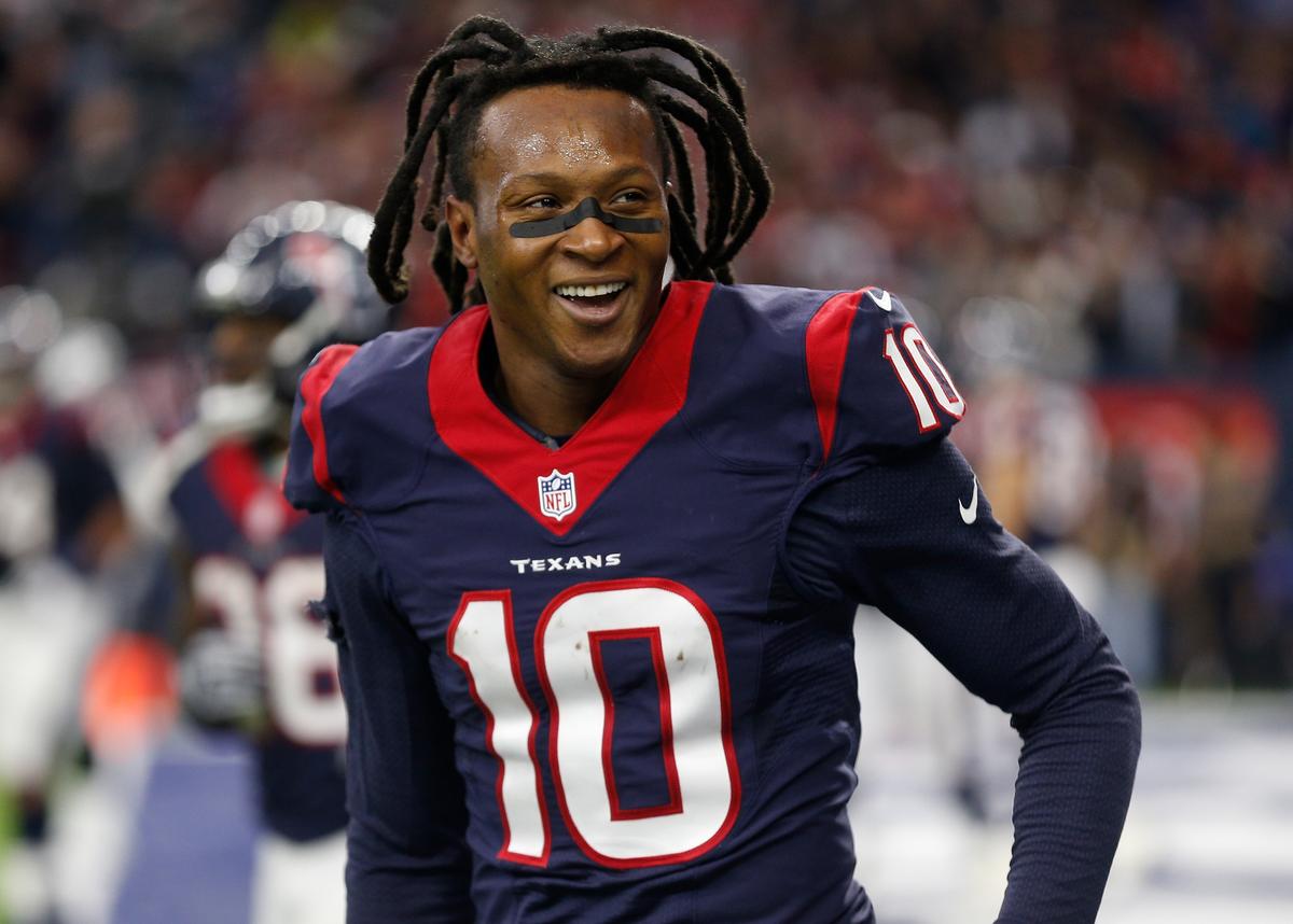 Hopkins celebrates after catching a touchdown pass during the AFC Wild Card game against the Oakland Raiders at NRG Stadium on Jan. 7, 2017. (©Getty Images | <a href="https://www.gettyimages.com/detail/news-photo/deandre-hopkins-of-the-houston-texans-celebrates-after-news-photo/631162030">Bob Levey</a>)