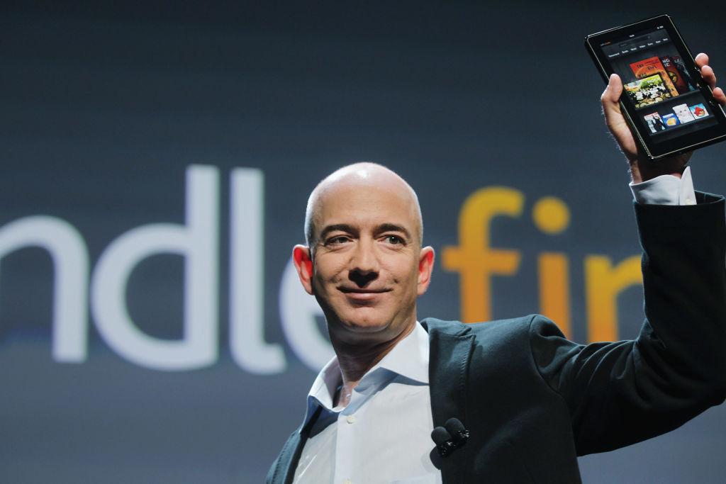 Amazon founder Jeff Bezos holds the new Amazon tablet called the Kindle Fire in New York City on Sept. 28, 2011. (Spencer Platt/Getty Images)
