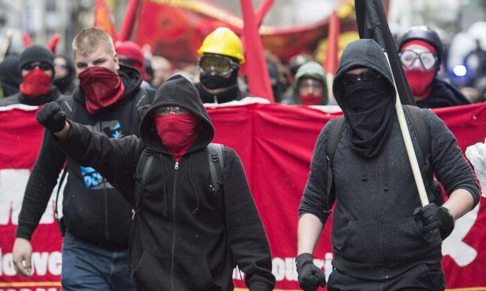 Masked Criminals or Lawful Protesters