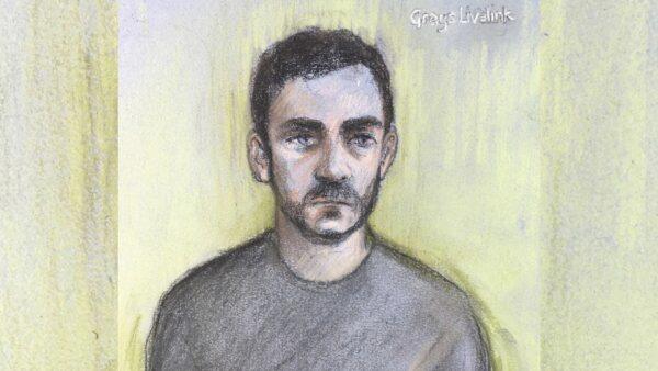 A court artist sketch by Elizabeth Cook, shows lorry driver Maurice Robinson on a video-link at Chelmsford Magistrates' Court, England on Oct. 28, 2019. (Elizabeth Cook/PA via AP)
