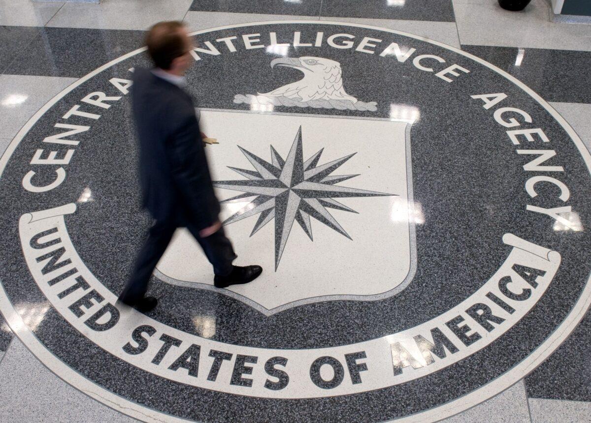  A man crosses the Central Intelligence Agency (CIA) logo in the lobby of CIA Headquarters in Langley, Va., on Aug. 14, 2008. (Saul Loeb/AFP via Getty Images)