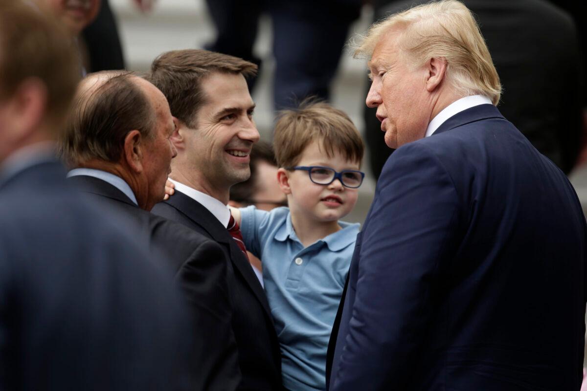 President Donald Trump greets Sen. Tom Cotton (R-Ark.) (L) during a South Lawn event at the White House in Washington on May 9, 2019. (Alex Wong/Getty Images)