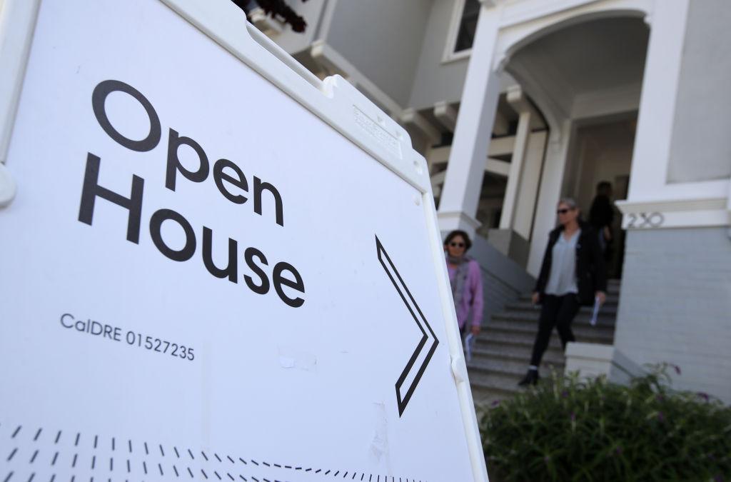 Real estate agents leave a home for sale during a broker open house in San Francisco on April 16, 2019. (Justin Sullivan/Getty Images)