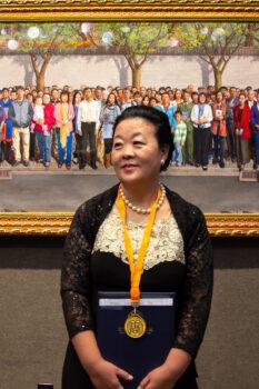 Haiyan Kong won the Gold Award at the 5th NTD International Figure Painting Competition with her work "April 25th, 1999" at the Salmagundi Club in New York on Nov. 26, 2019. (Chung I Ho/The Epoch Times)