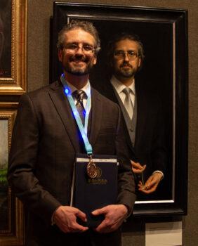 Joseph Daily won the Bronze Award at the 5th NTD International Figure Painting Competition with his work "Self Portrait Preparing for Worship" on Nov. 26, 2019, at the Salmagundi Club in New York. (Chung I Ho/The Epoch Times)