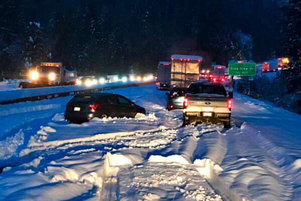Cars and trucks in stopped traffic on Interstate 5 near Dunsmuir, Calif, on Nov. 26, 2019. (Caltrans via AP)