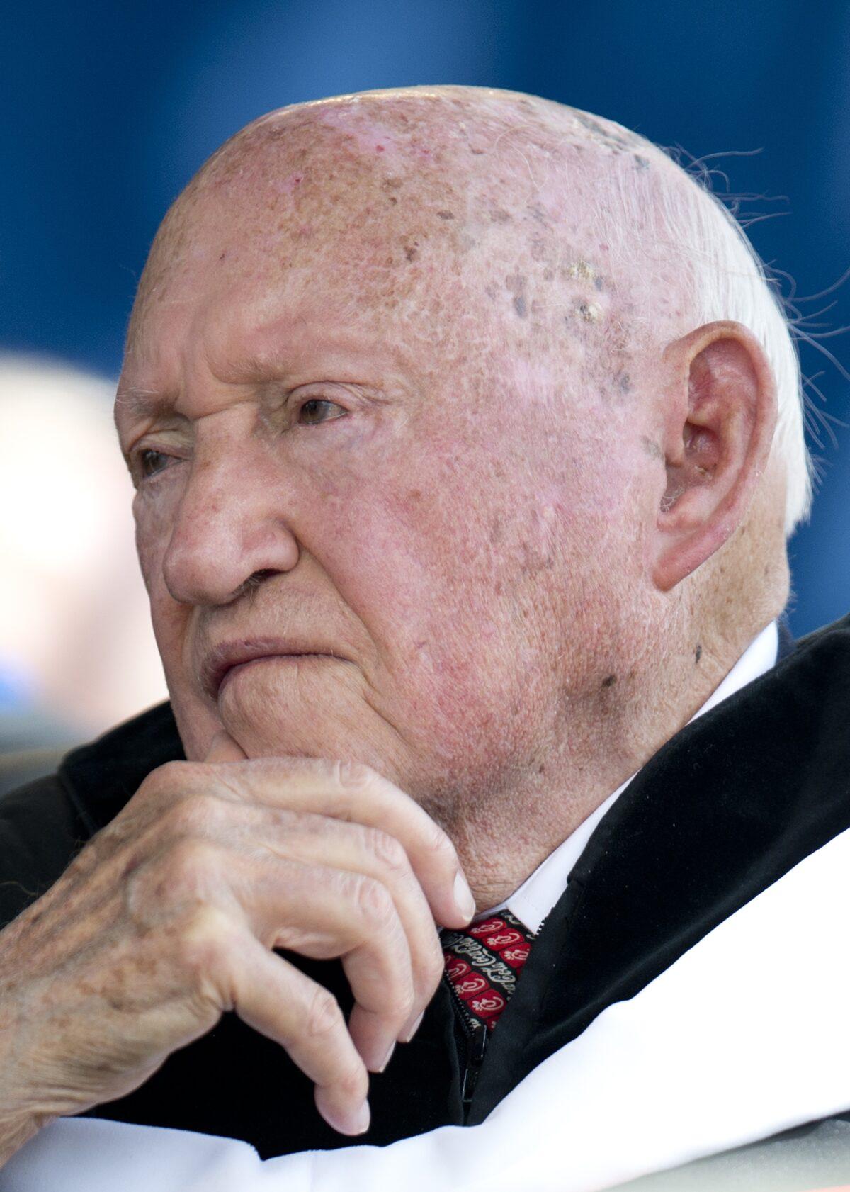 Chick-fil-A founder and Chairman S. Truett Cathy listens during the keynote address delivered by Republican presidential candidate Mitt Romney at Liberty University's 39th Annual Commencement in Lynchburg, Virginia, on May 12, 2012. (Jim Watson/AFP/GettyImages)