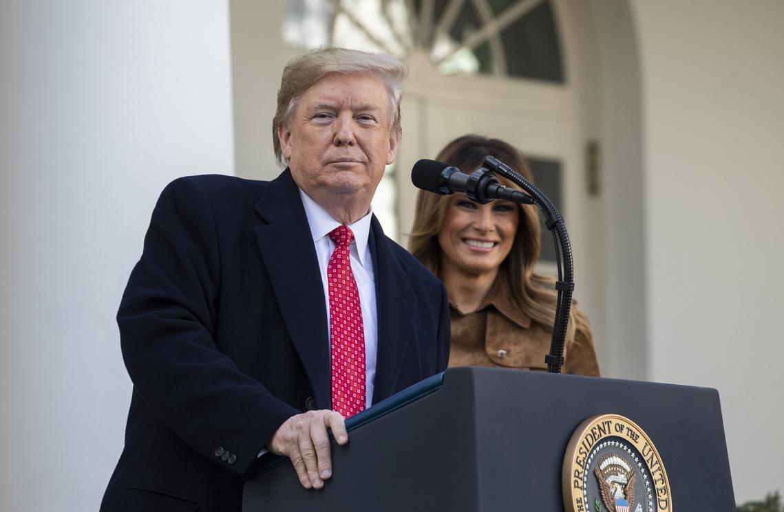 With First Lady Melania Trump looking on, President Donald Trump speaks before giving the National Thanksgiving Turkey Butter a presidential pardon in the Rose Garden of the White House in Washington on Nov. 26, 2019. (Drew Angerer/Getty Images)