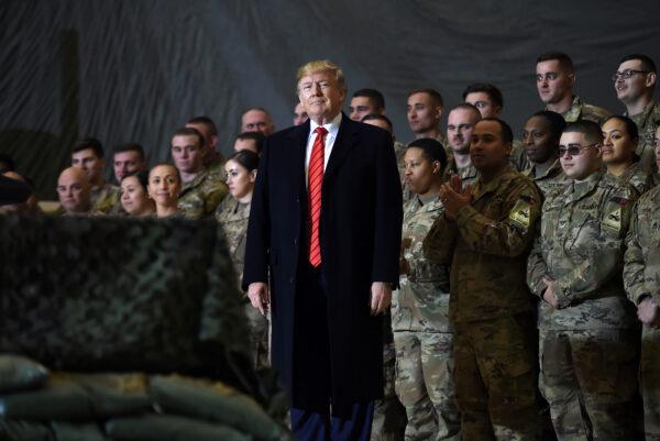 U.S. President Donald Trump speaks to the troops during a surprise Thanksgiving day visit at Bagram Air Field, in Afghanistan on Nov. 28, 2019. (Olivier Douliery/AFP via Getty Images)