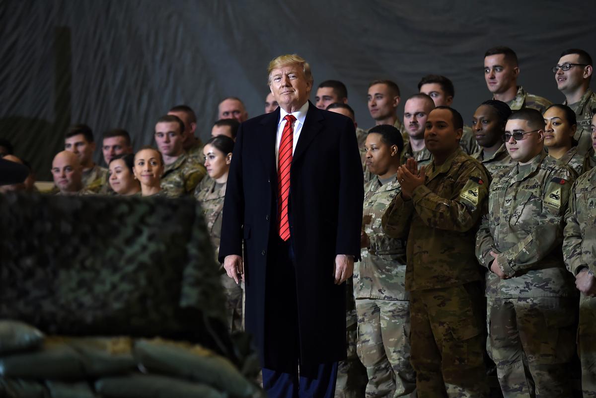 President Donald Trump speaks to the troops during a surprise Thanksgiving day visit at Bagram Air Field, in Afghanistan on Nov. 28, 2019. (Olivier Douliery/AFP via Getty Images)