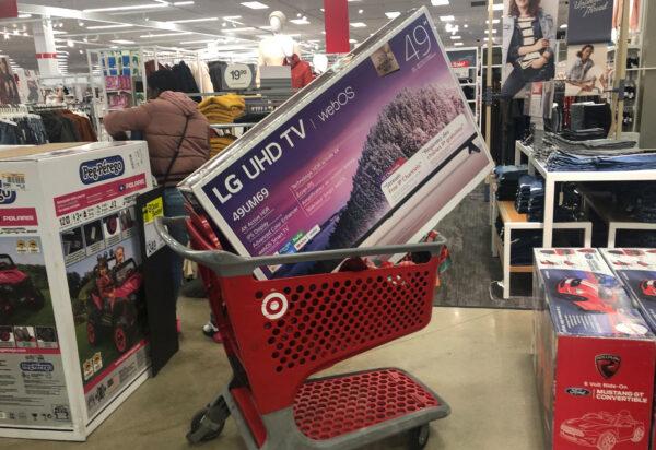A shopping cart is filled with a television during a sales event on Thanksgiving day at Target in Westbury, N.Y., on Nov. 28, 2019. (Shannon Stapleton/Reuters)