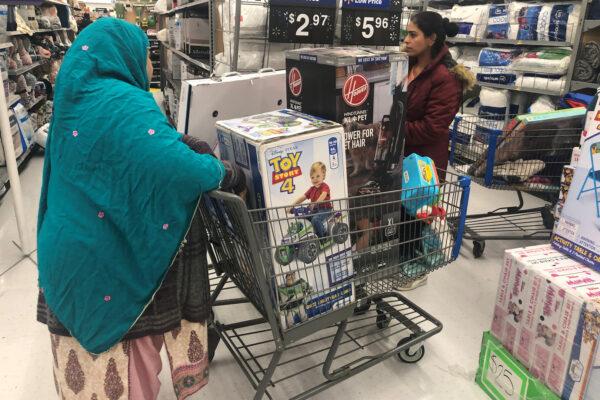 People shop during a sales event on Thanksgiving day at Walmart in Westbury, N.Y., on Nov. 28, 2019. (Shannon Stapleton/Reuters)