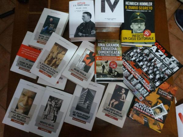 Italian police handout shows books that they say were seized in searches of properties of an extreme political group who planned to create a new Nazi party, in an unidentified location in Italy in a picture released on Nov. 28, 2019. (Polizia di Stato/Handout via REUTERS)
