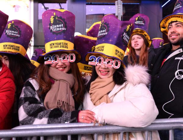 Celebrators attend the Times Square New Year's Eve 2020 Celebration in New York City on Dec. 31, 2019. (Noam Galai/Getty Images)